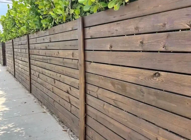 Horizontal wood fence and gate installation in Fort Lauderdale, Florida.