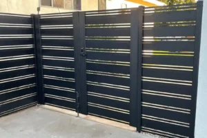 Professional aluminum gate installation for residential property in Pompano Be