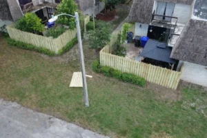 HOA fence replacement in Sunrise FL commercial project with composite and aluminum fencing installation South Florida